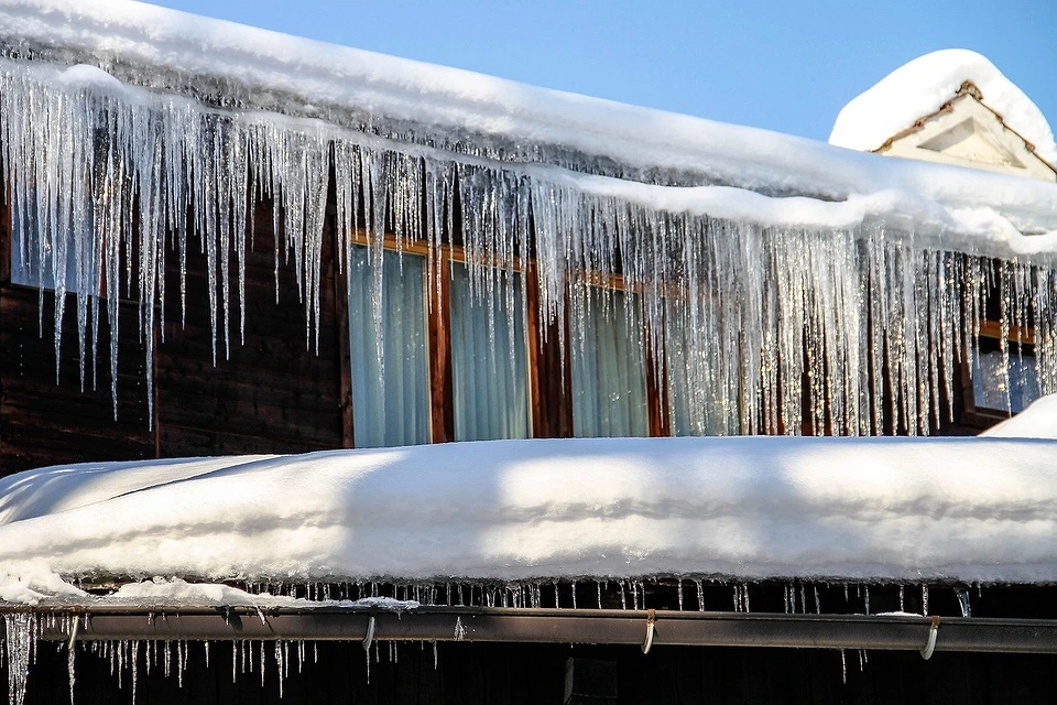 How To Safely Remove Ice And Snow From Your Roof Tips And