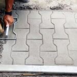 How to pour a concrete sidewalk with imitation stone